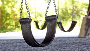 Some of the new swings are seen. A total of 11 new swings have been installed. SWINGPARK - The new swing park near the corner of East Brady and North Water Streets beneath the N. Holton St. Bridge on Wendesday, July 23, 2014, included newly designed swings that are a collaboration between the City of Milwaukee, the Brady Street BID #11, and the grassroots organization beintween (Òin betweenÓ). Beintween installed swings at the site in Fall 2012. When the swings fell into disrepair, they were removed by DPW in Fall 2013 as a safety precaution. The agencies worked together to redesign and rebuild the swings using recycled materials including rubber tires, metals and wood. A total of 11 new swings have been installed, including a set of baby swings and a metal swing that is ADA accessible. The cushioned ground beneath the swings has also been replaced with shredded rubber tires, and new lighting has been installed for a safer experience. Photo by Mike De Sisti / MDESISTI@JOURNALSENTINEL.COM